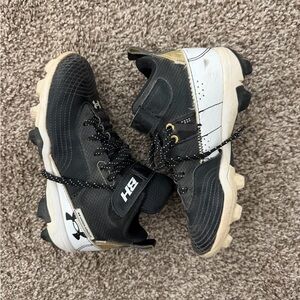 Under Armour Black White and Cream Baseball Cleats